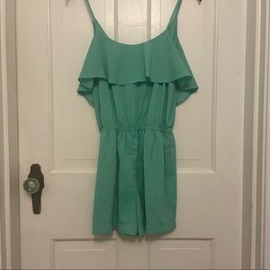 Naked Zebra green romper, size small, gently used, some mild discoloration